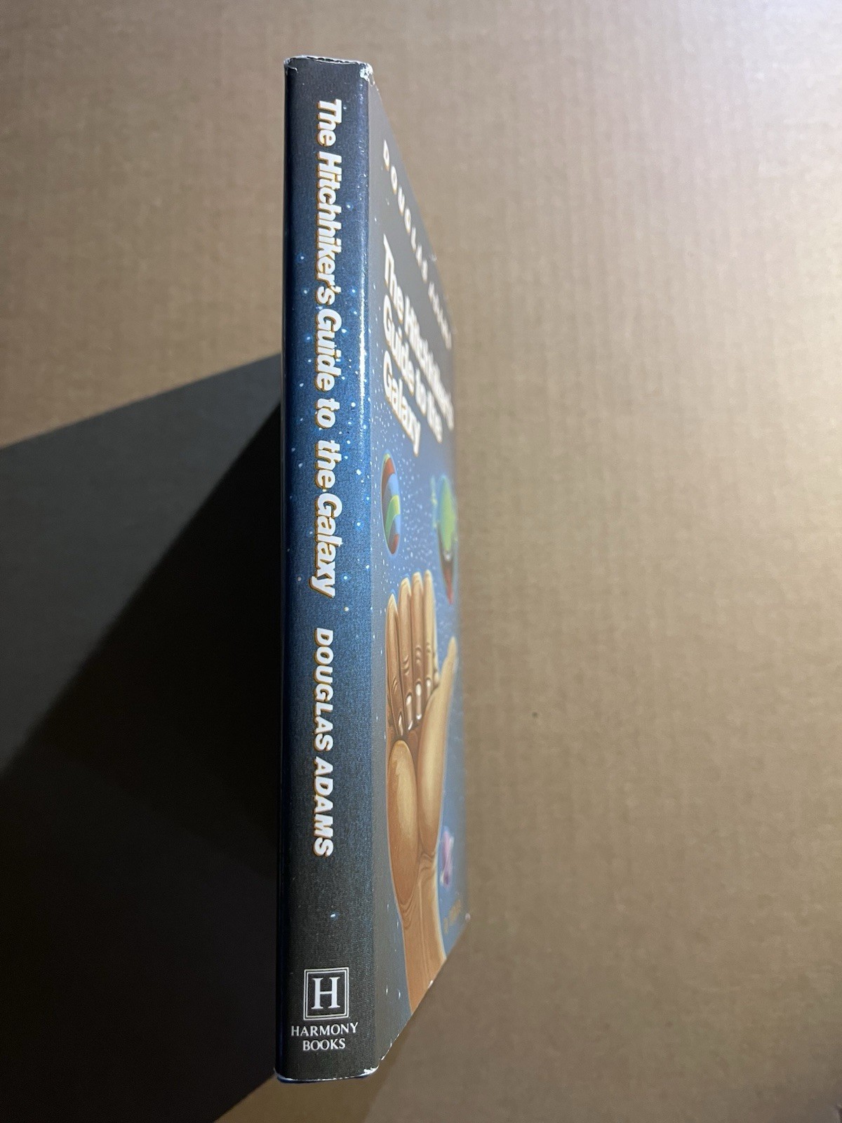 THE HITCHHIKER’S GUIDE TO THE GALAXY by Douglas Adams Harmony BCE hardcover