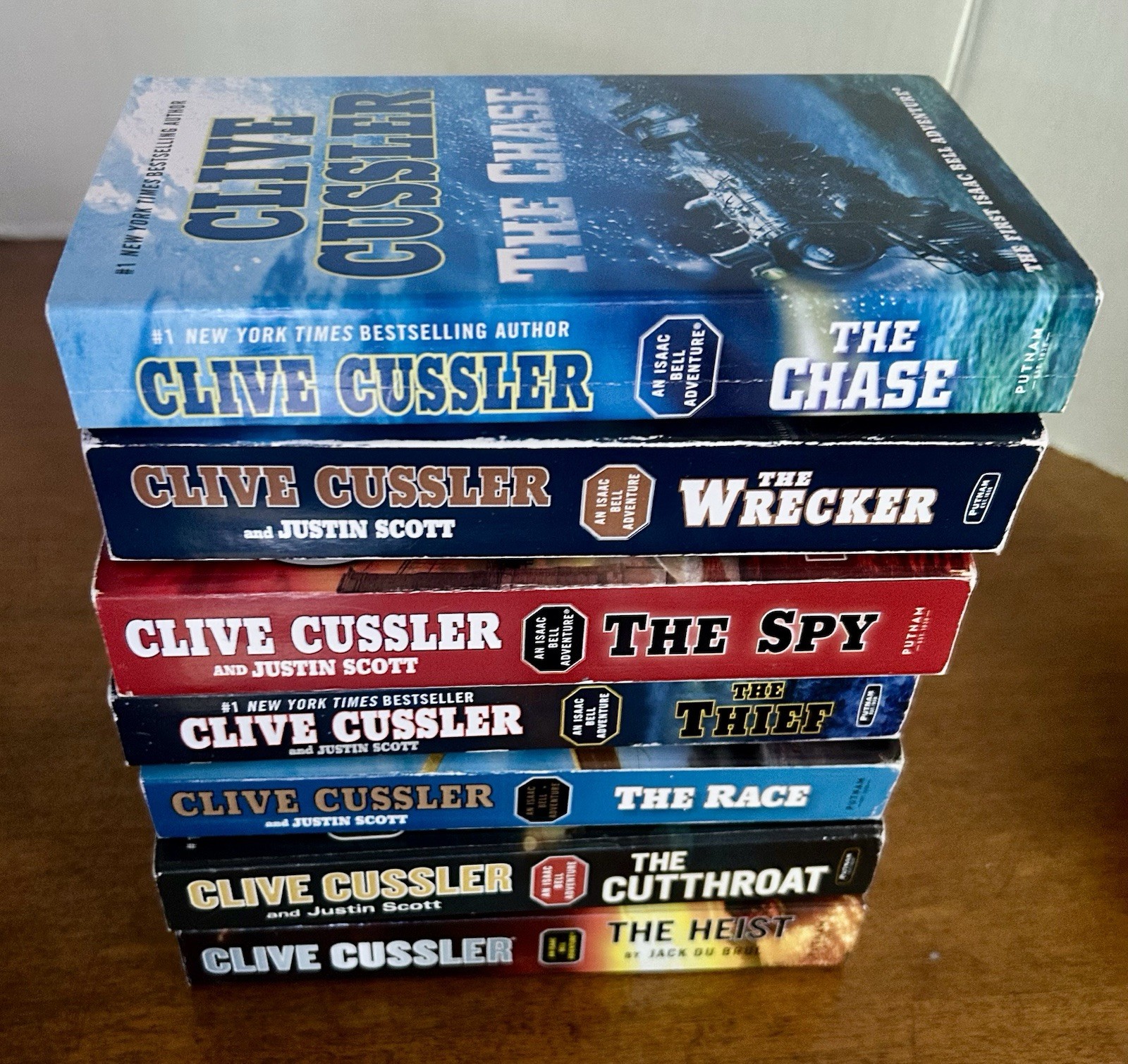 Clive Cussler Isaac Bell Adventure Series Lot of 7 PB books G to VG paperbacks