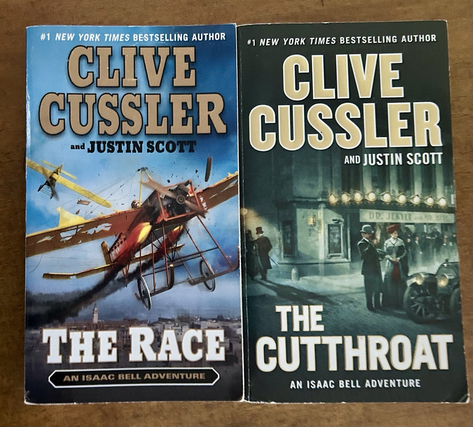 Clive Cussler Isaac Bell Adventure Series Lot of 7 PB books G to VG paperbacks