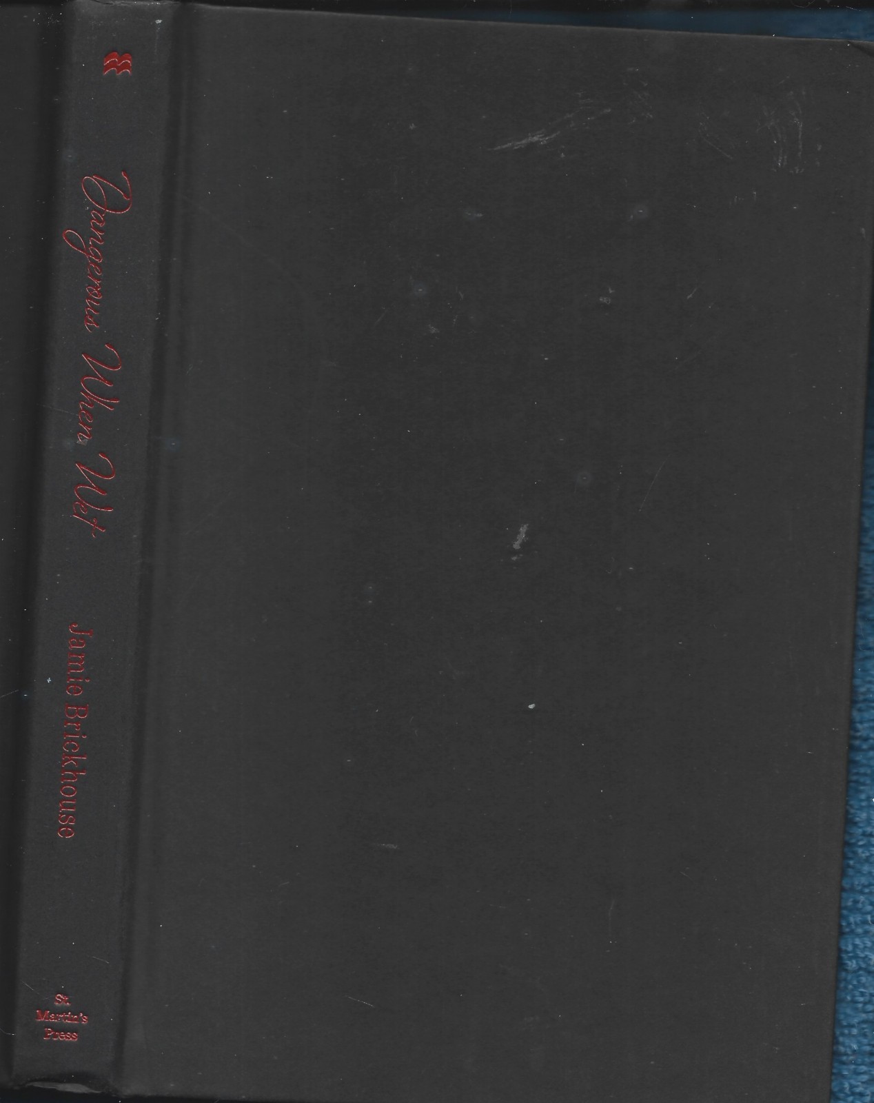 Inscribed Dangerous When Wet HB w/dj-Jamie Brickhouse-272 pages-2015-1st Ed.