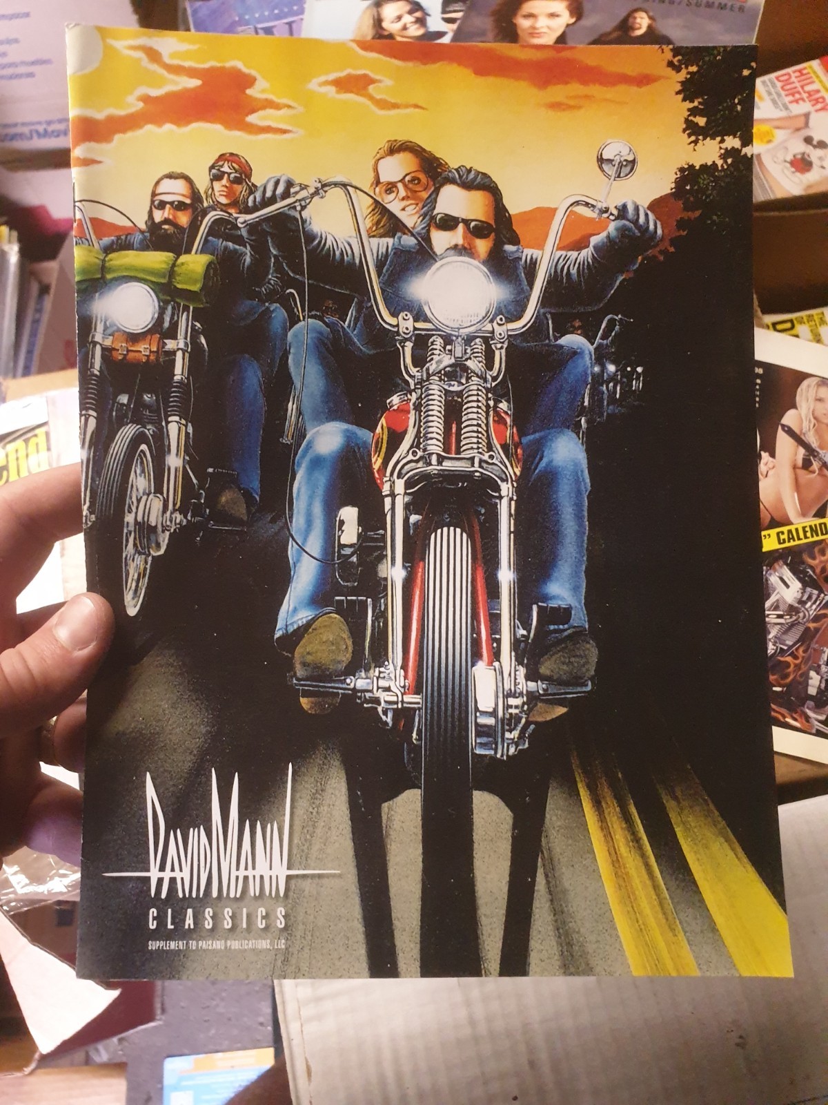 Lot 14: Vintage Biker In The Wind Custom Chopper Easyriders Magazines +Calendars