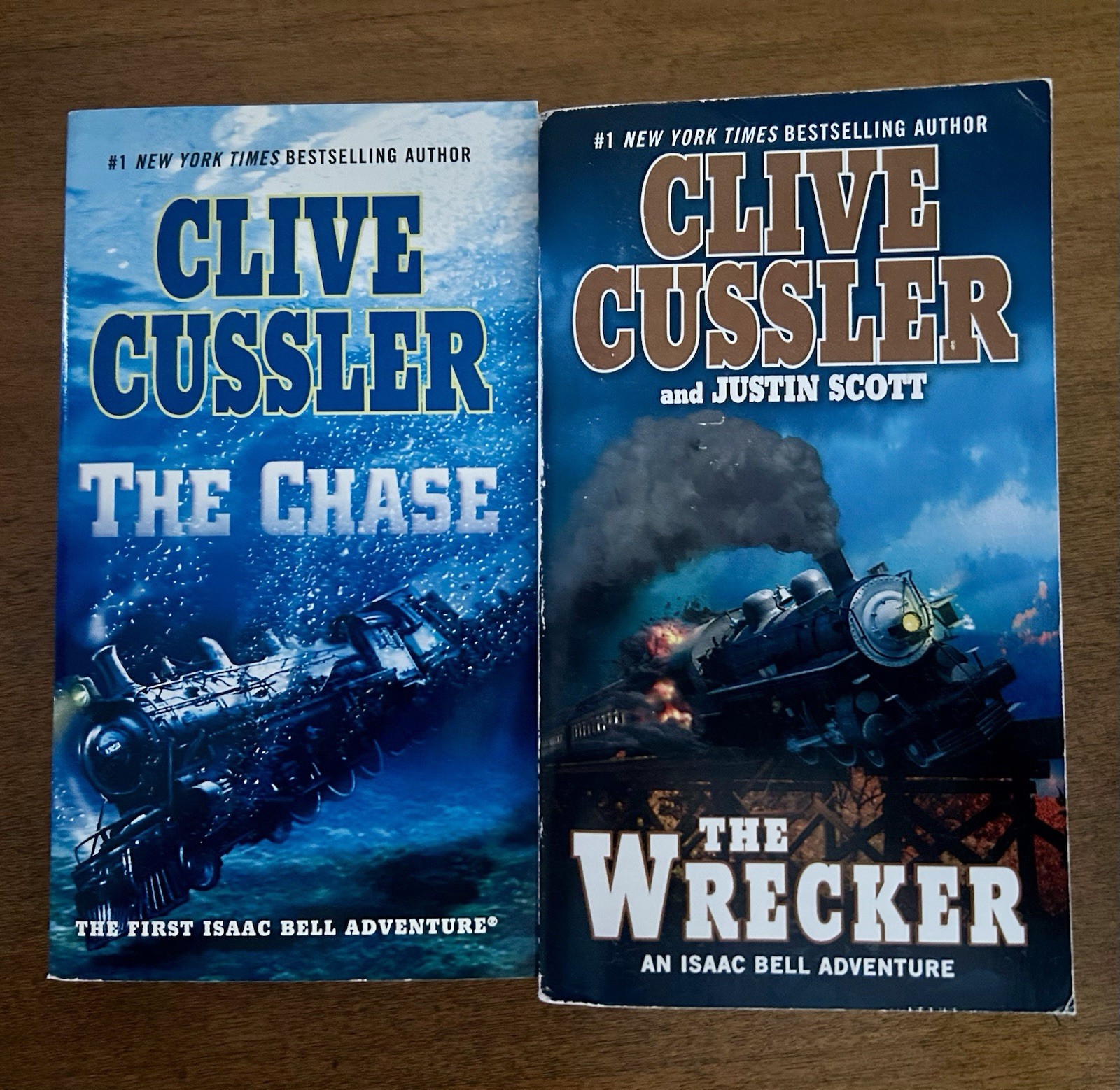 Clive Cussler Isaac Bell Adventure Series Lot of 7 PB books G to VG paperbacks