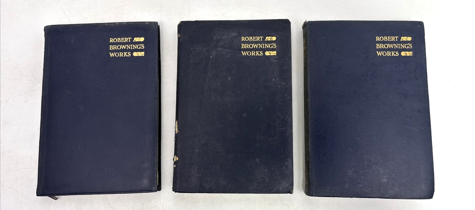 Small Old Leather Books for Decoration. 11.5cm shelf space. Max 16.5cm Tall
