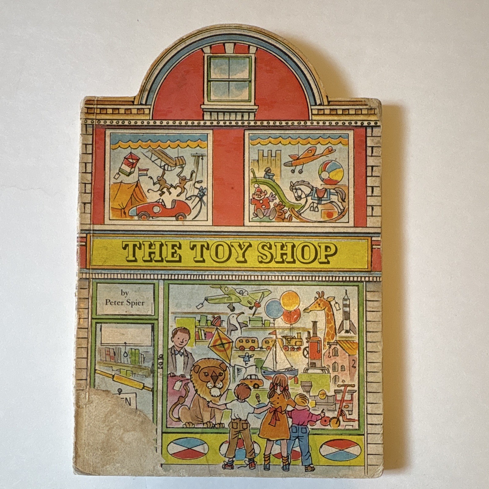 Peter Spier THE TOY SHOP Peter Spier’s Village Board Book shaped HC 1981