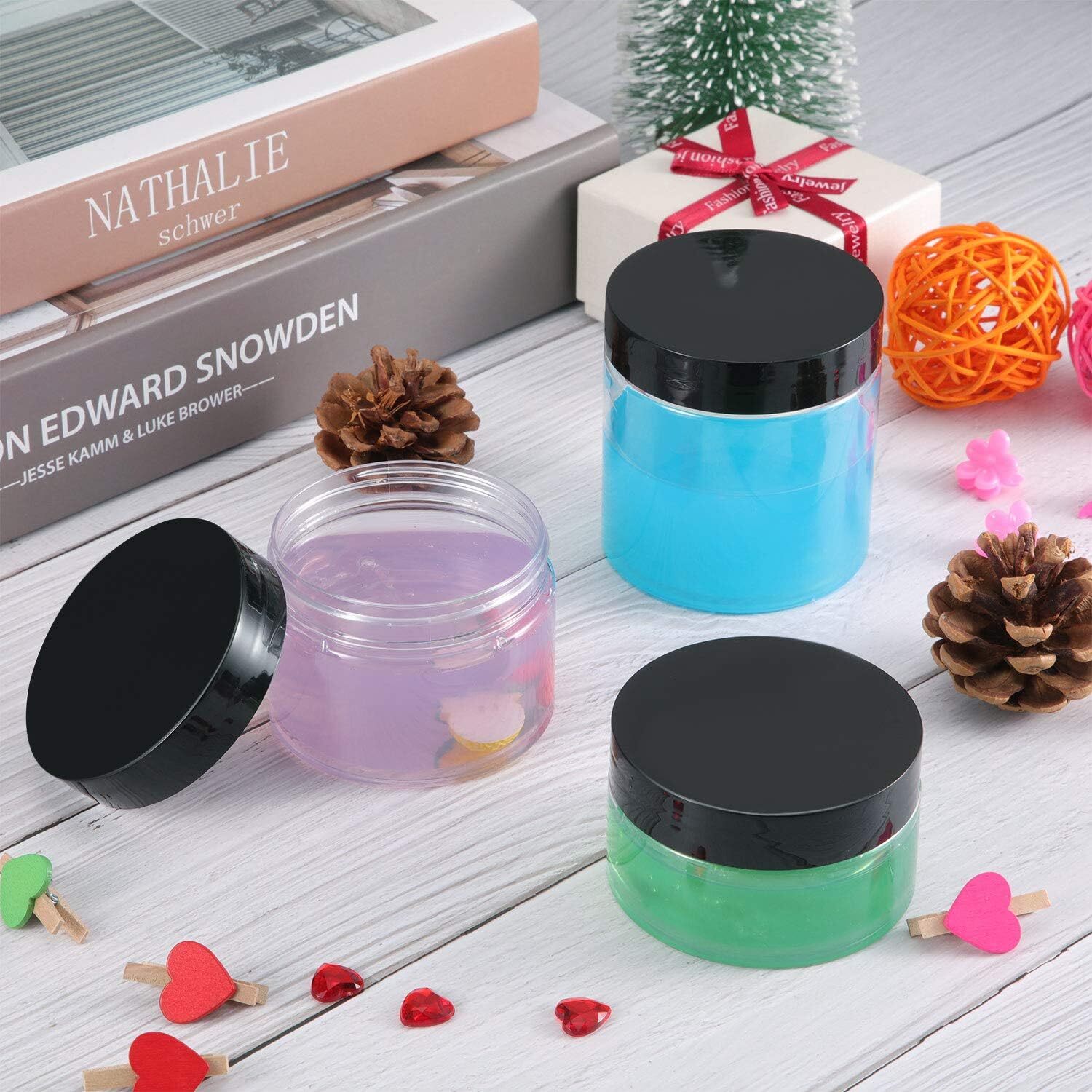 SATINIOR 24 Pieces Empty Clear Plastic Jars with Lids Round 1 OZ, Black Lid