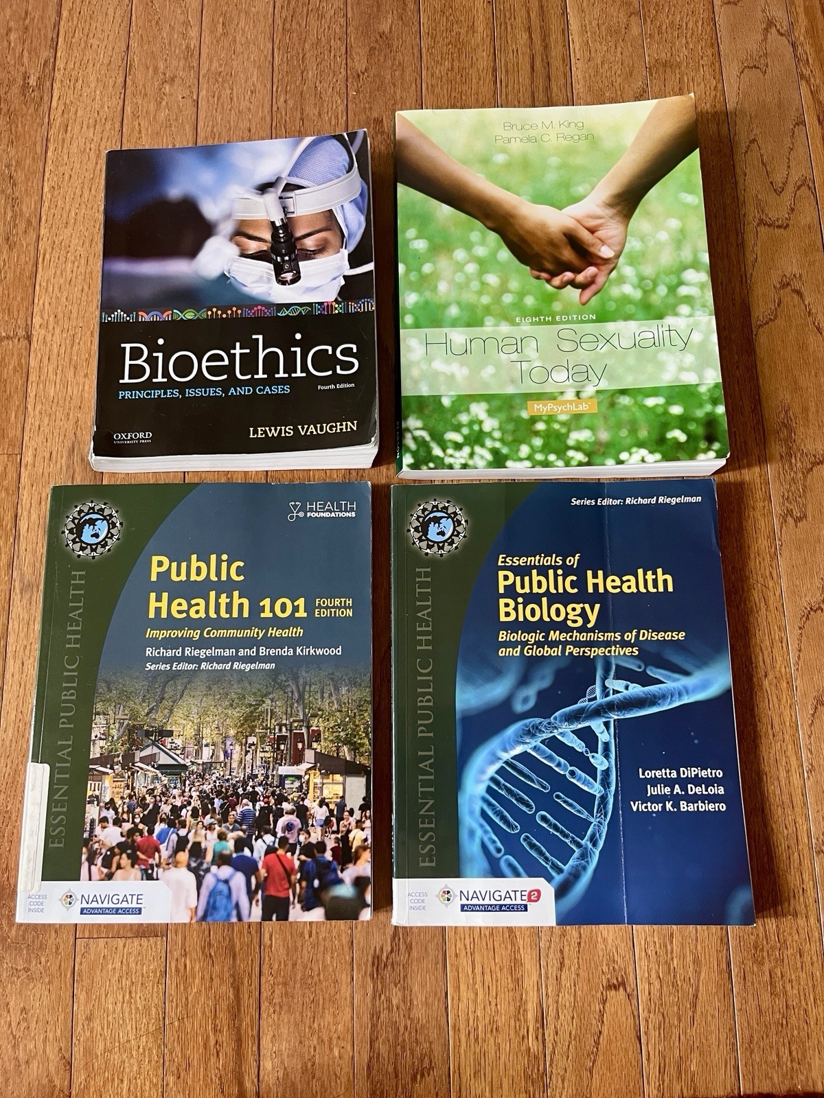 Four (4) – Medical, Health Care Textbooks (details in description)