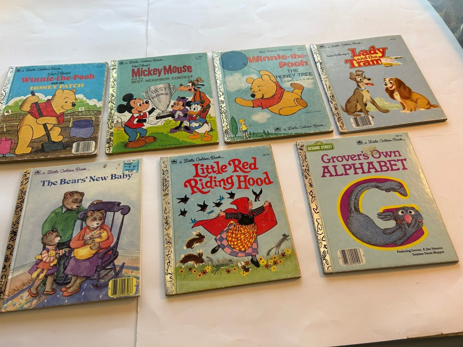 Little Golden Books Lot of 7- Mickey, Winnie, Little Red, Bears,Grover,Lady & Tr