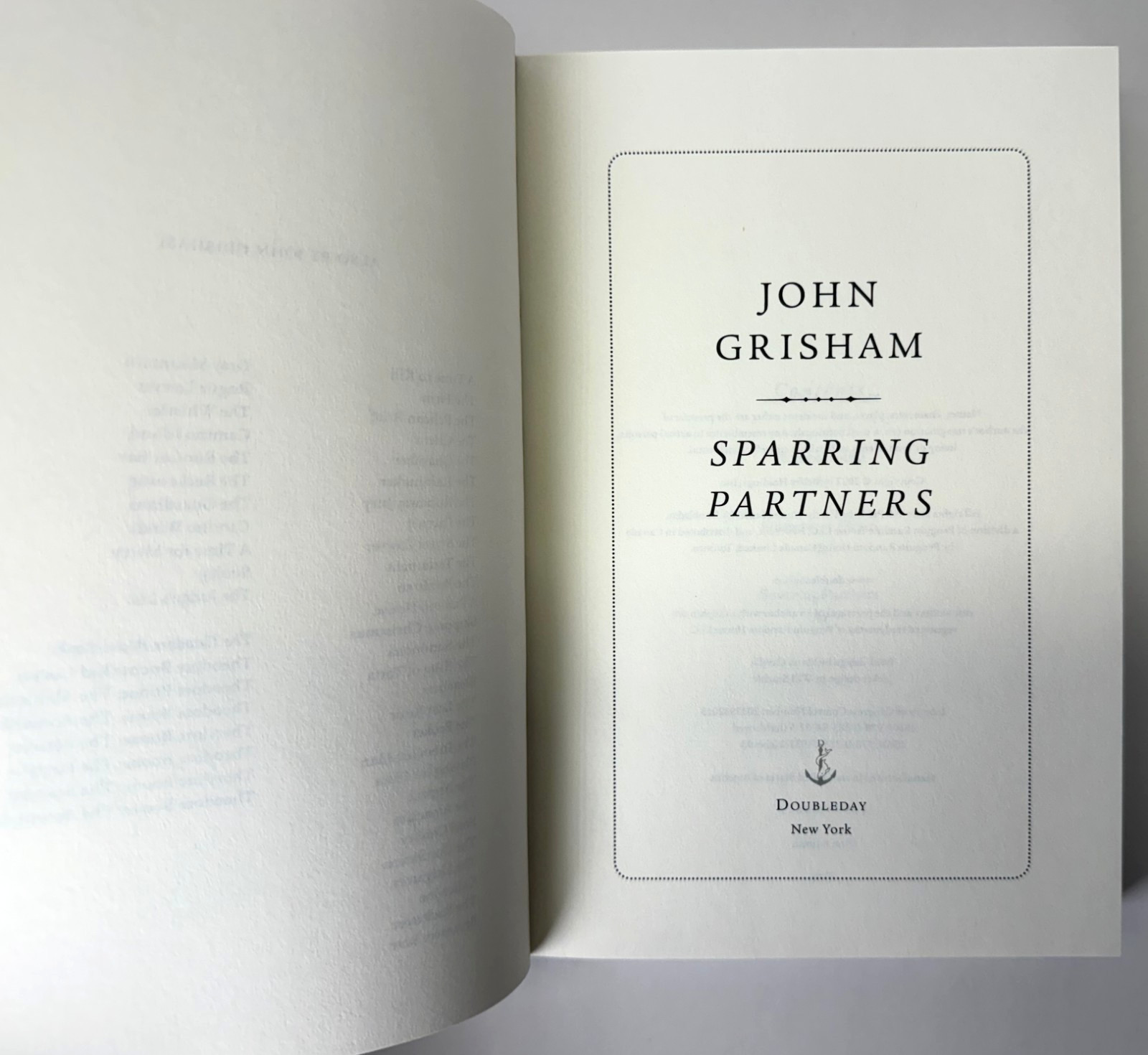 Sparring Partners SIGNED by John Grisham 2022 1st ed 1st printing in Mylar, Fine