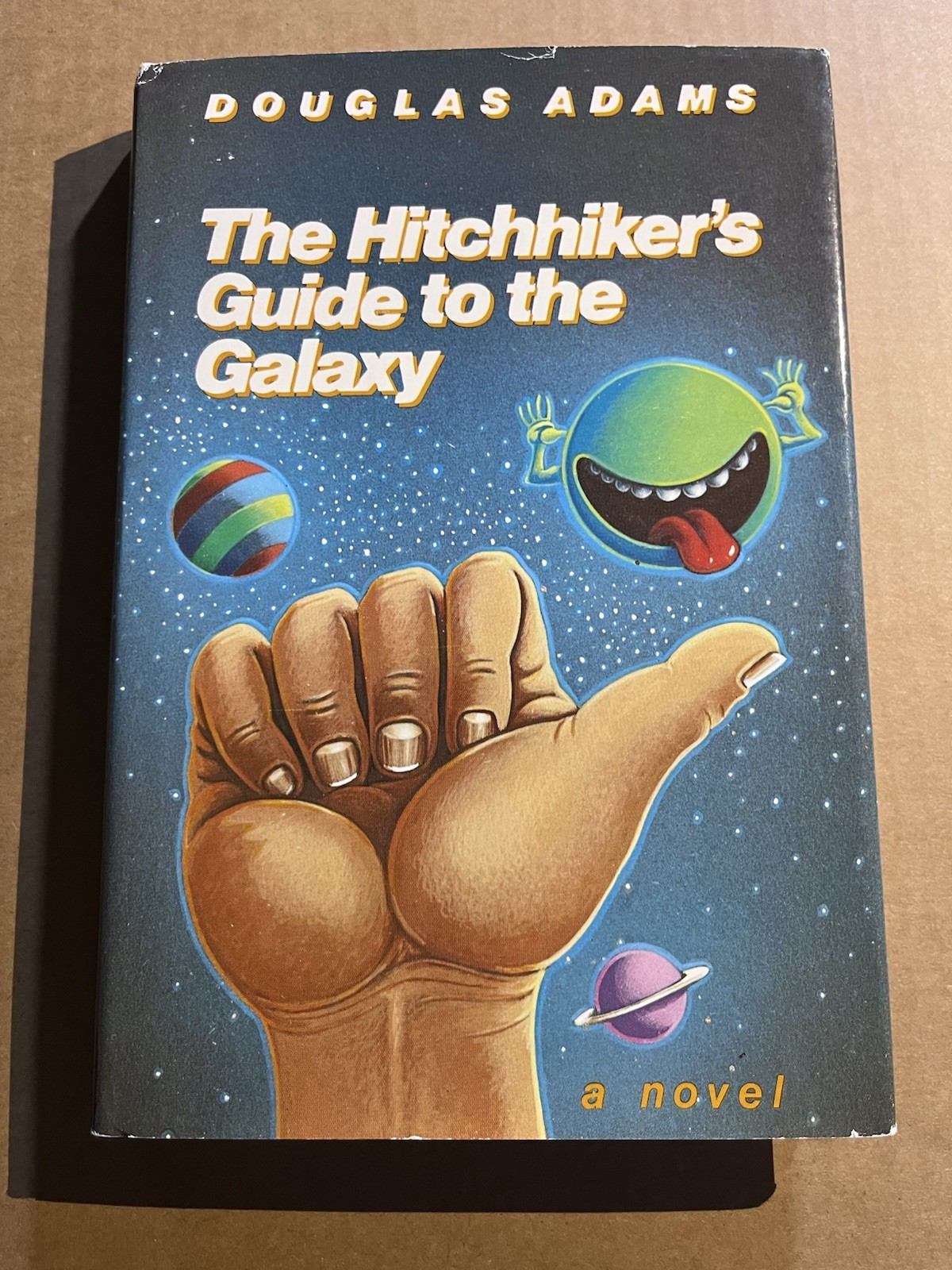 THE HITCHHIKER’S GUIDE TO THE GALAXY by Douglas Adams Harmony BCE hardcover
