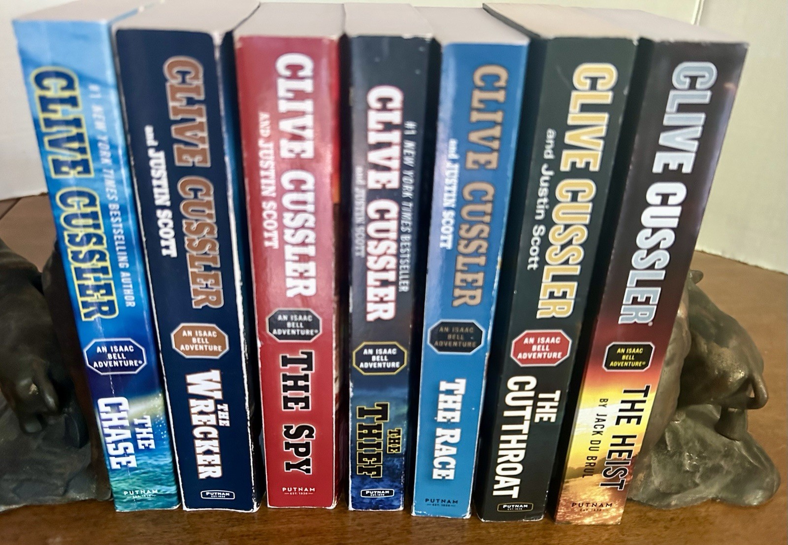 Clive Cussler Isaac Bell Adventure Series Lot of 7 PB books G to VG paperbacks