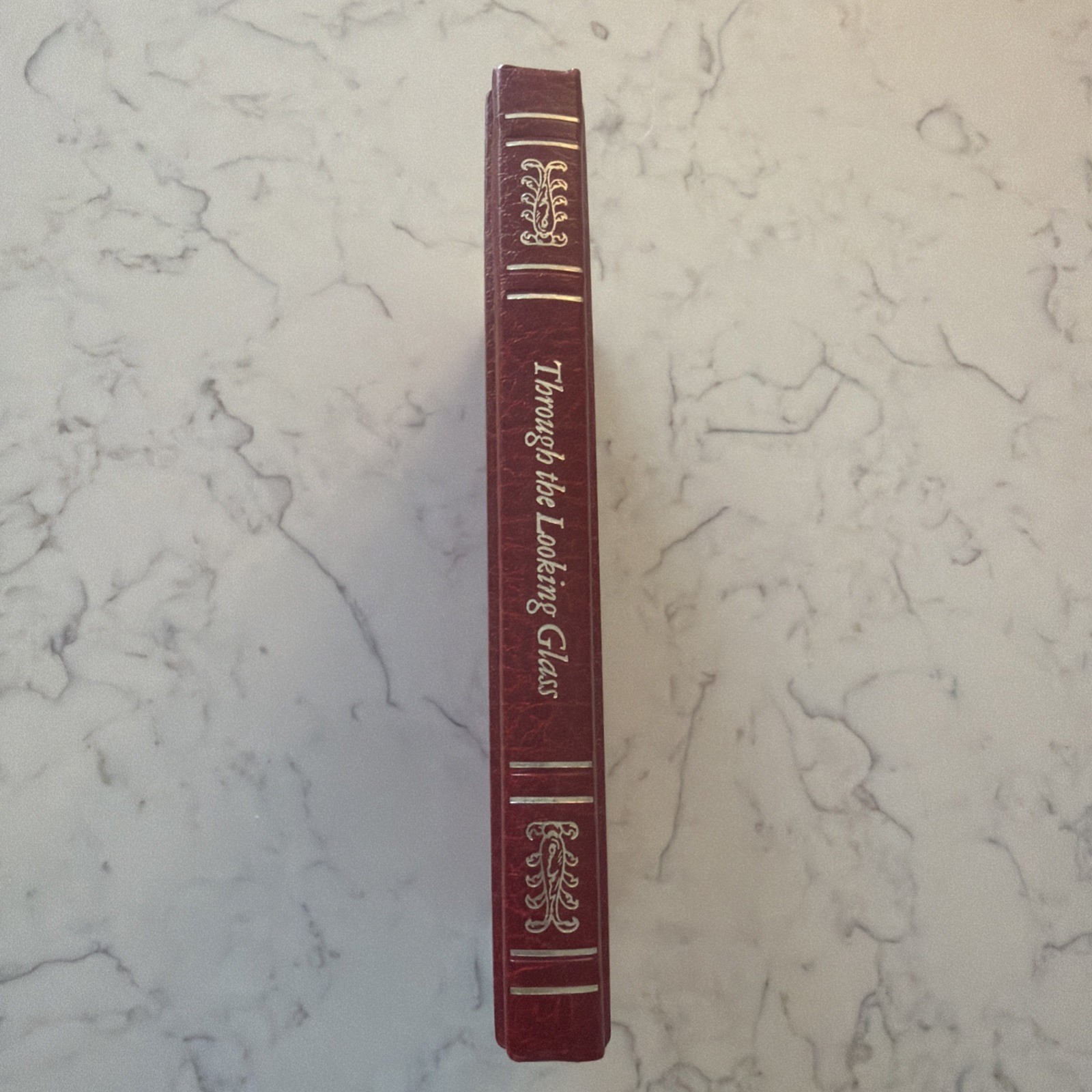 Through the Looking Glass: And What Alice Found There by Lewis Carroll Hardcover