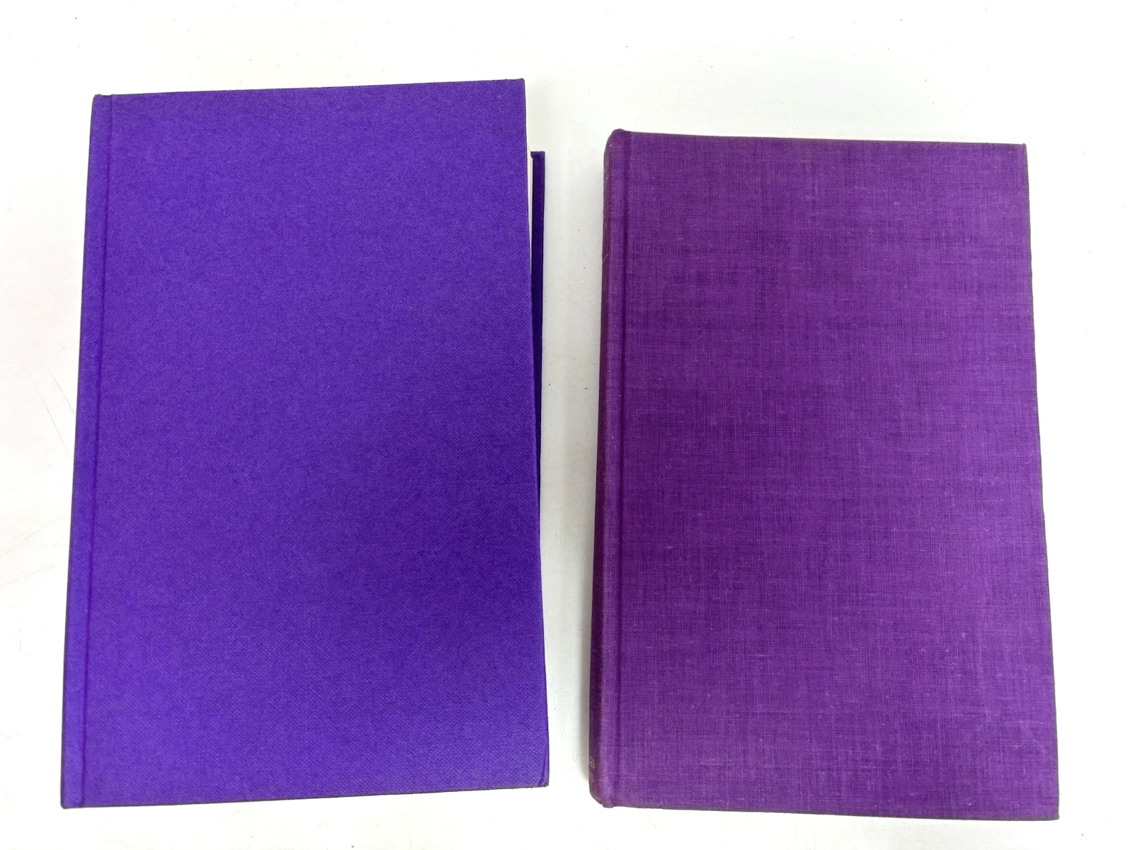 Collection of Purple Books for Decoration. 15.5cm shelf space.