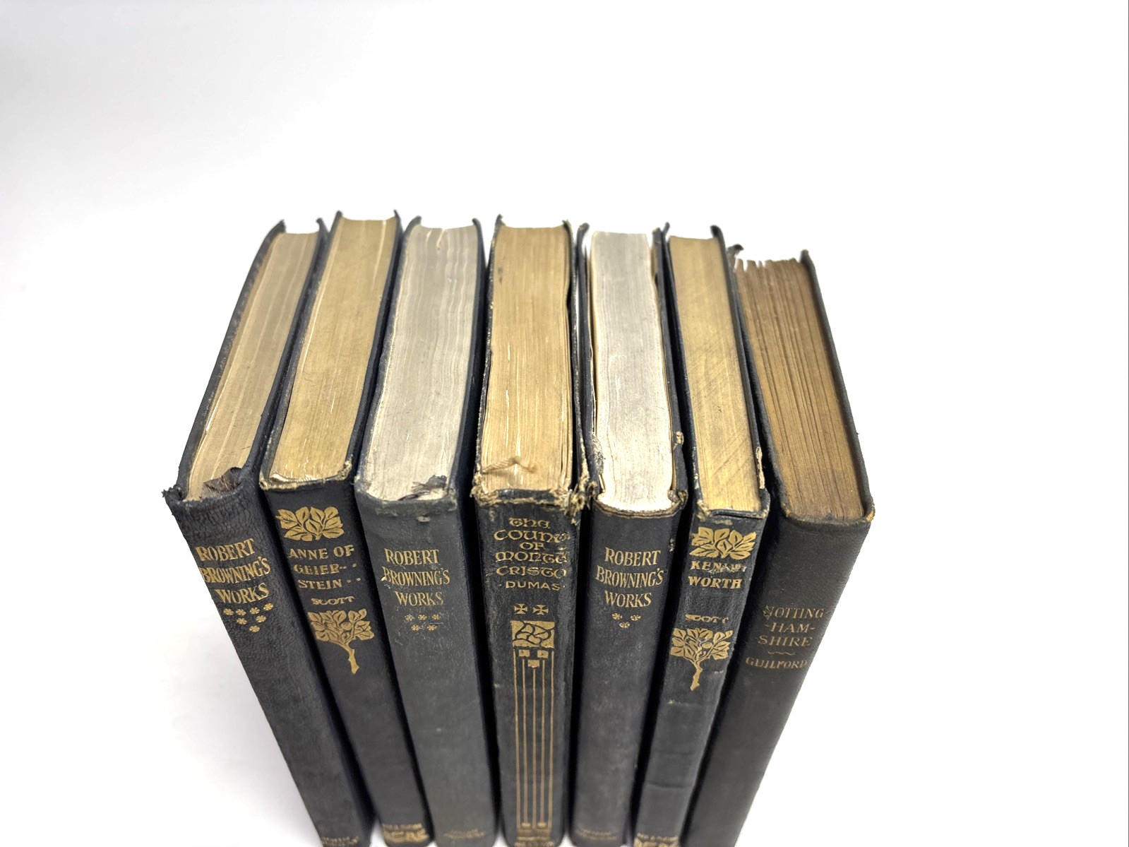 Small Old Leather Books for Decoration. 11.5cm shelf space. Max 16.5cm Tall