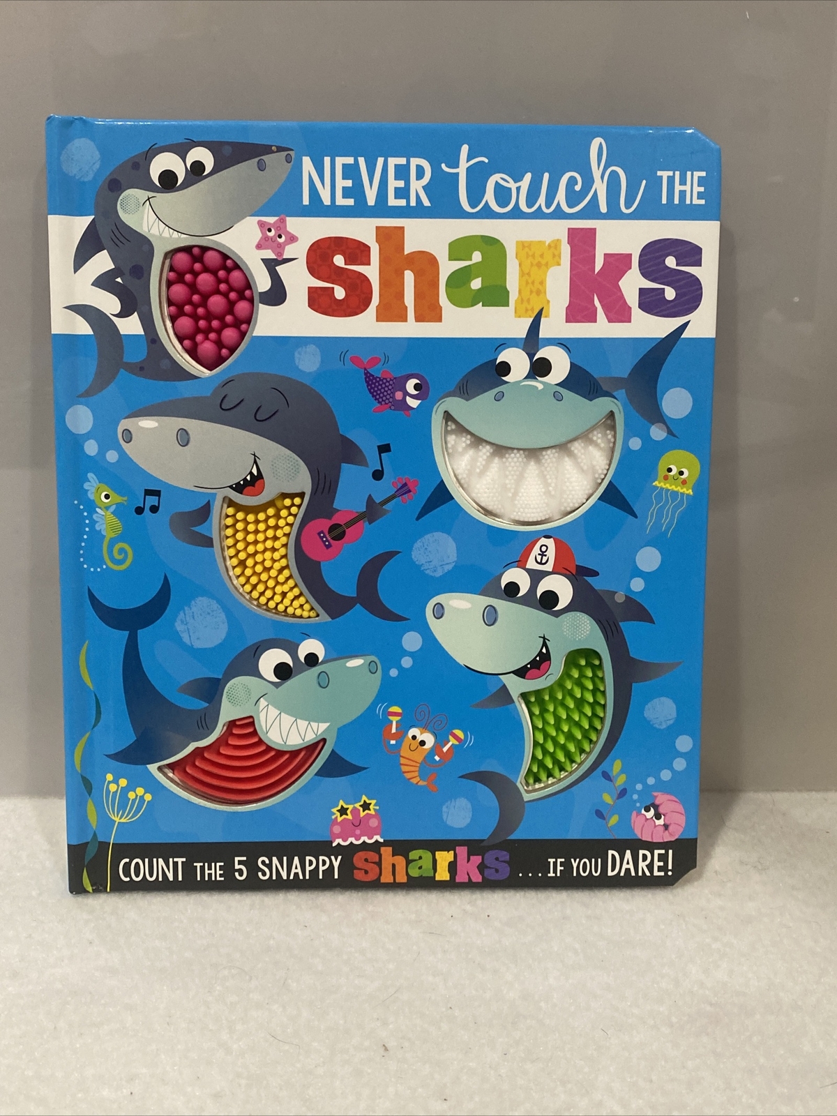 Never Touch the Sharks! by Rosie Greening
