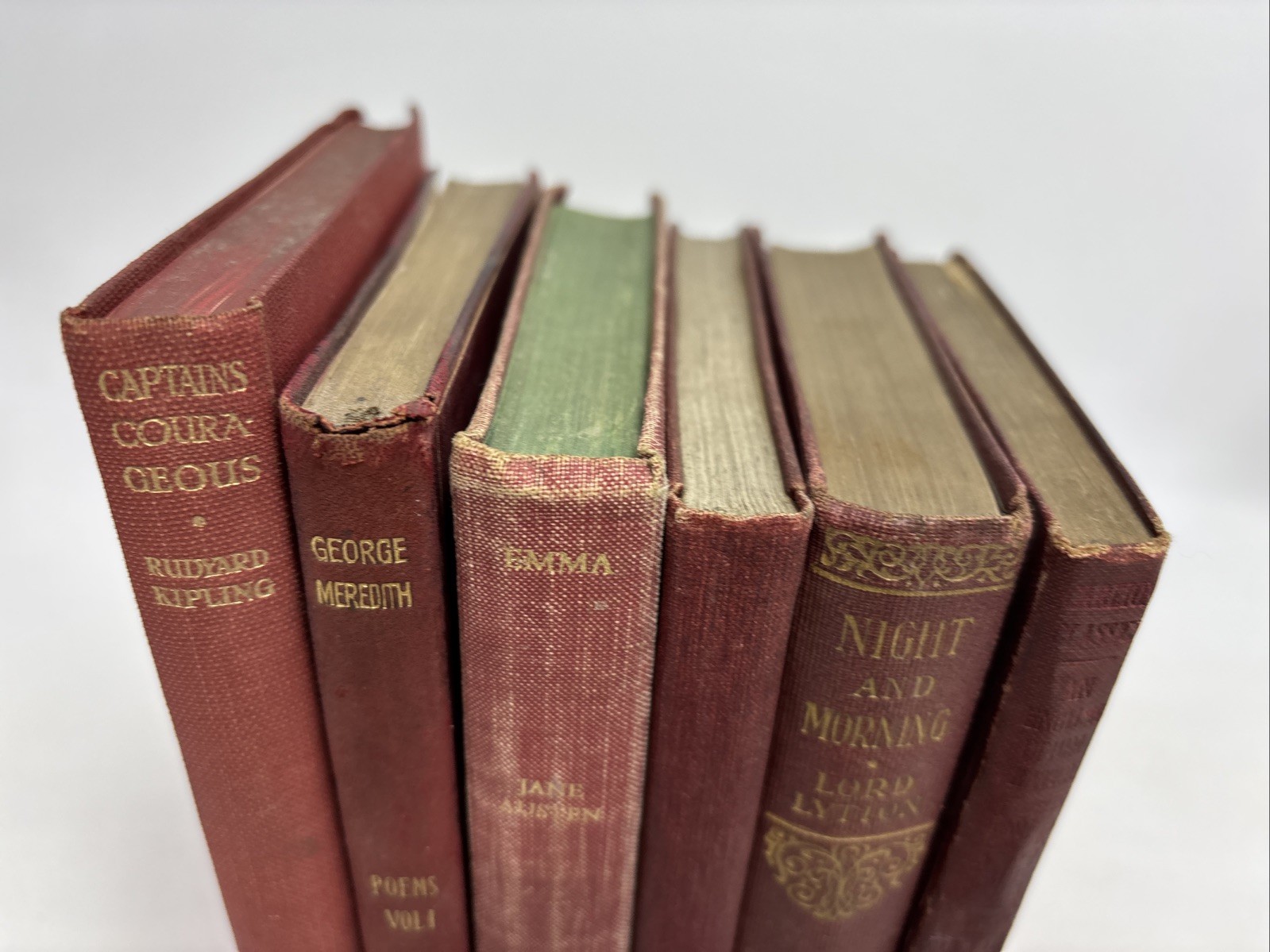 Small Old Red Books for Decoration. 10.5cm shelf space. Max. 17.5cm Tall